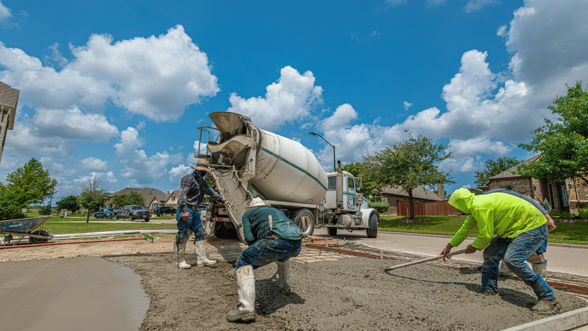 LIZZARD Concrete Construction crew working on a freshly finished concrete walkway